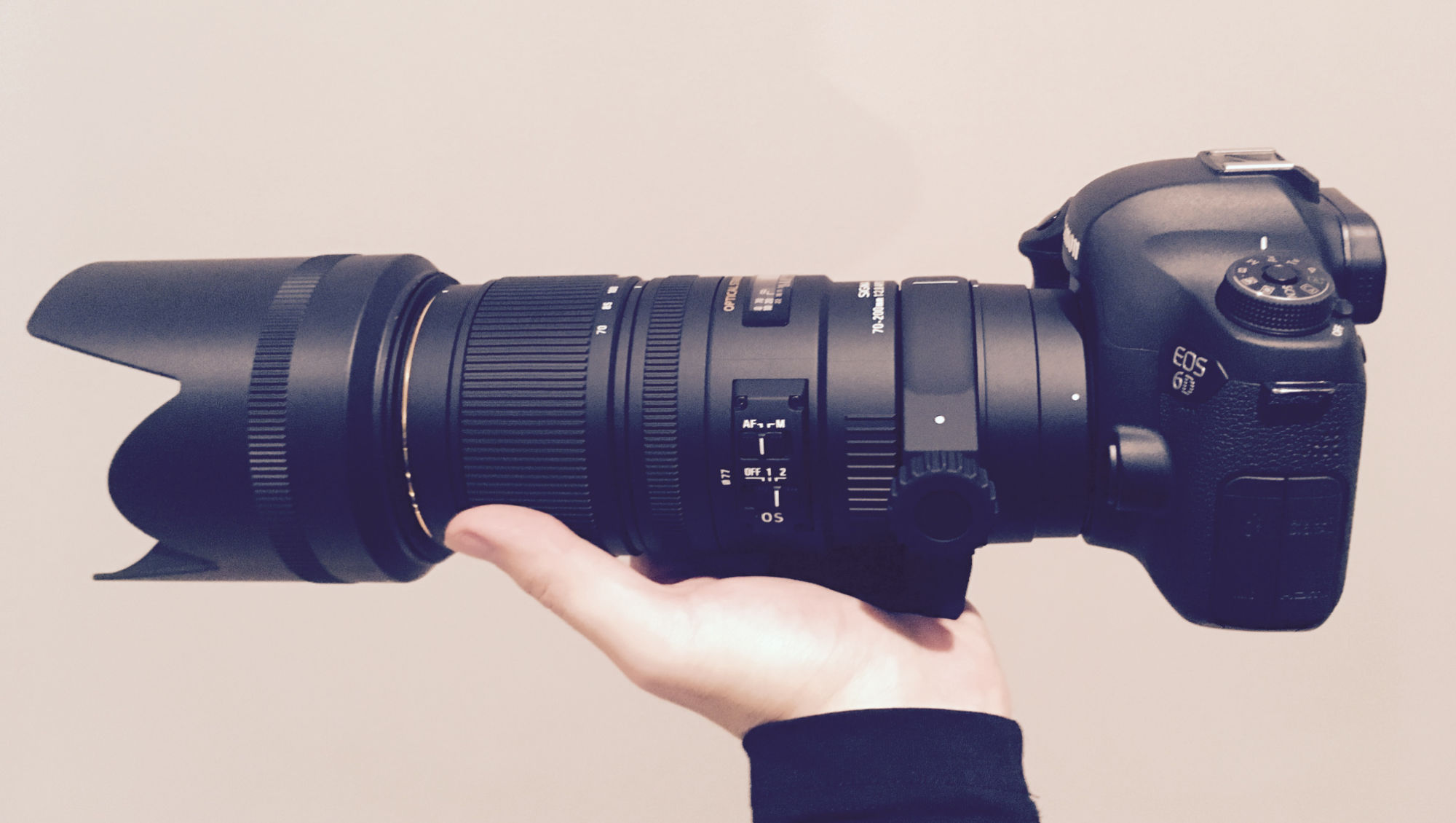 photo of a Canon 6D DSLR with a long 70-200mm Sigma lens attached